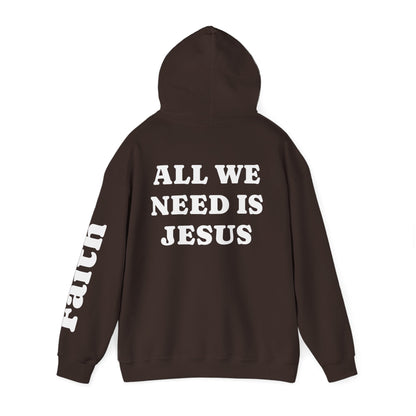 Christian Hoodie — "All We Need Is Jesus" Religious Pullover with Faith Sleeve Print