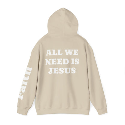 Christian Hoodie — "All We Need Is Jesus" Religious Pullover with Faith Sleeve Print